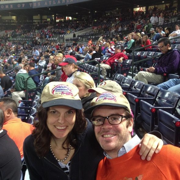 Amy and Adam at a baseball game